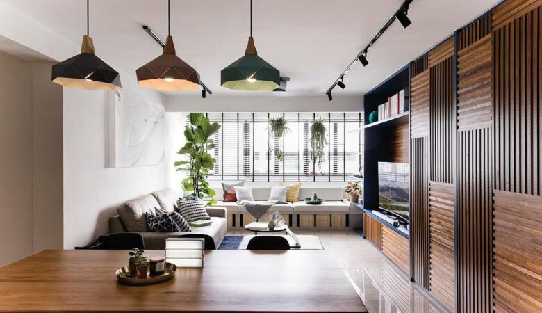 intérieur lumineux et moderne, mettant en avant des éléments comme des meubles en bois naturel, des plantes d’intérieur, des luminaires intelligents et des couleurs terreuses