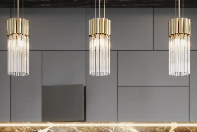 intérieur moderne, épuré, où des suspensions sculpturales en métal et verre, des lampes connectées et des lampes à énergie solaire décorent l’espace